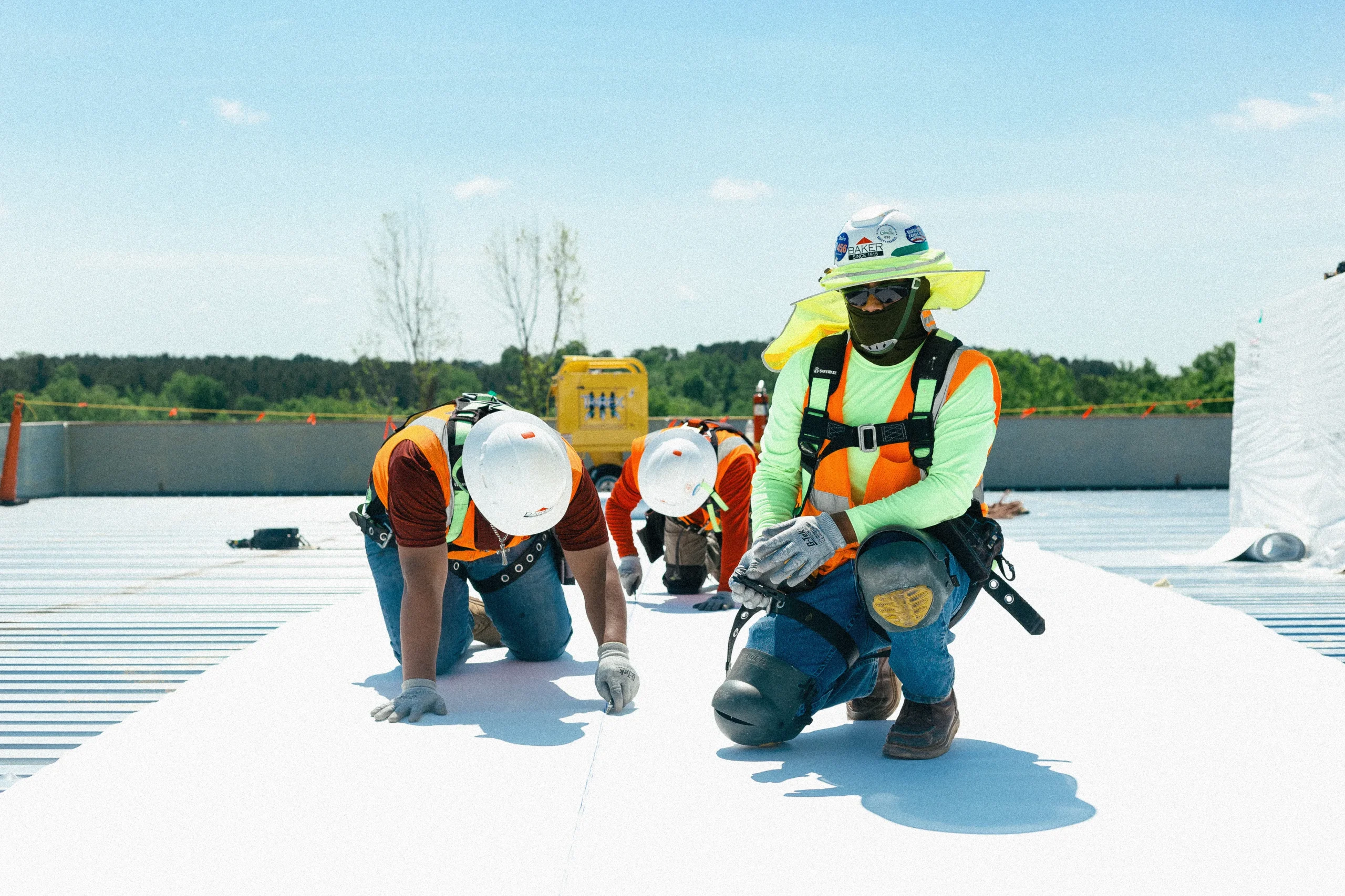 Roofing professionals working on a project